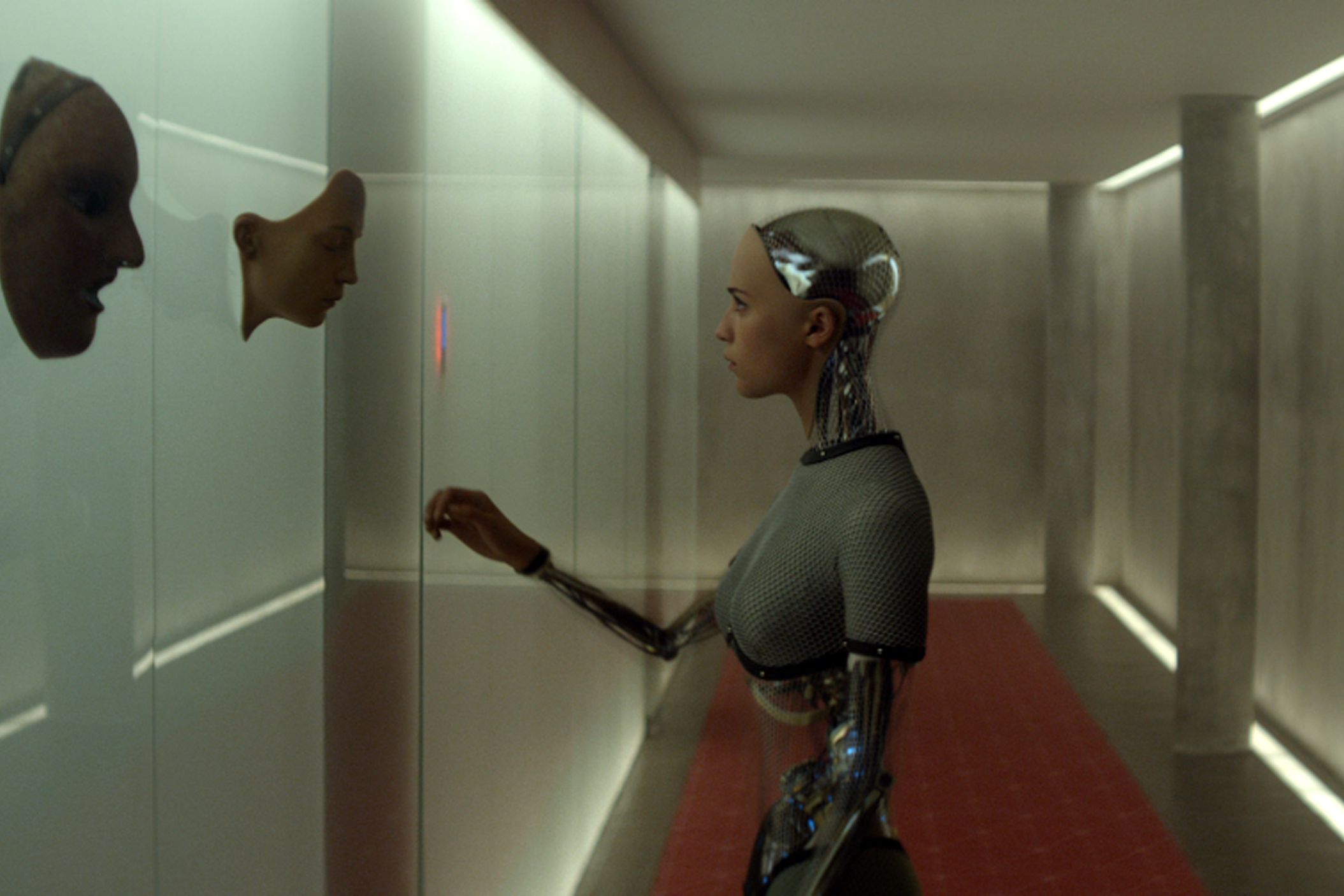Ava faces the artificial masks in Ex Machina